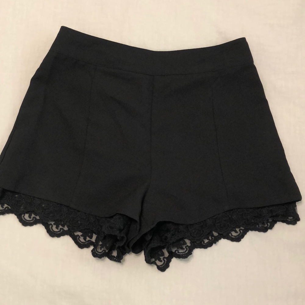 Black high waisted shorts with lace accent